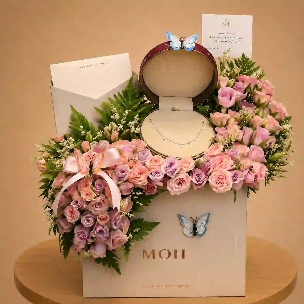 هدايا عيد ميلاد فخمة | طقم عقد سلسال وورد MOH | الرياض